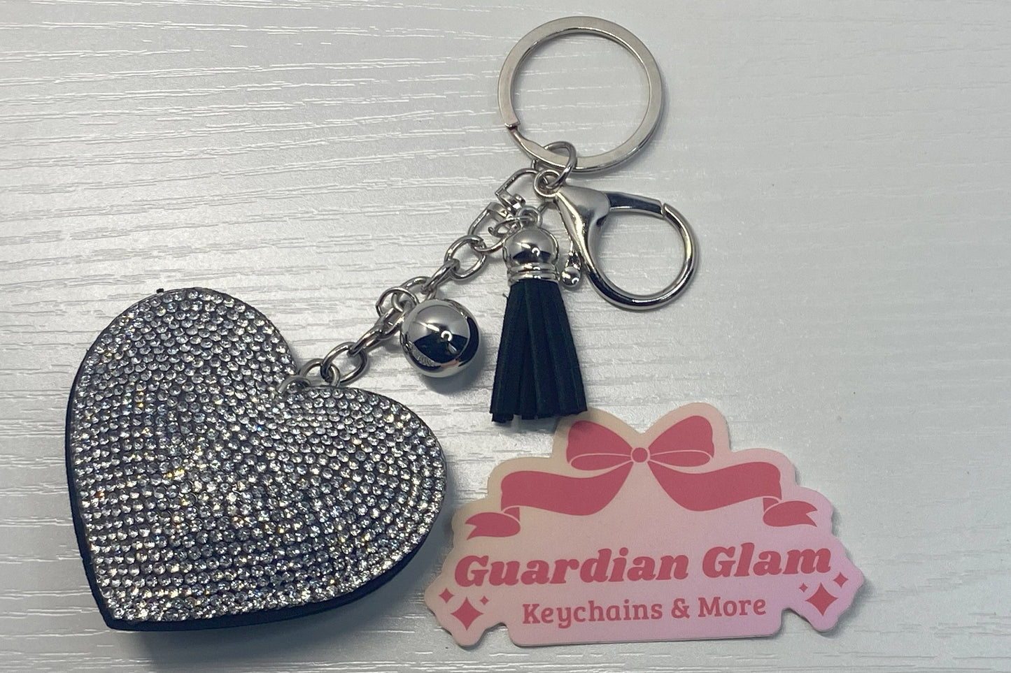 Black Heart-shaped White rhinestone Sliver keychain with tassel