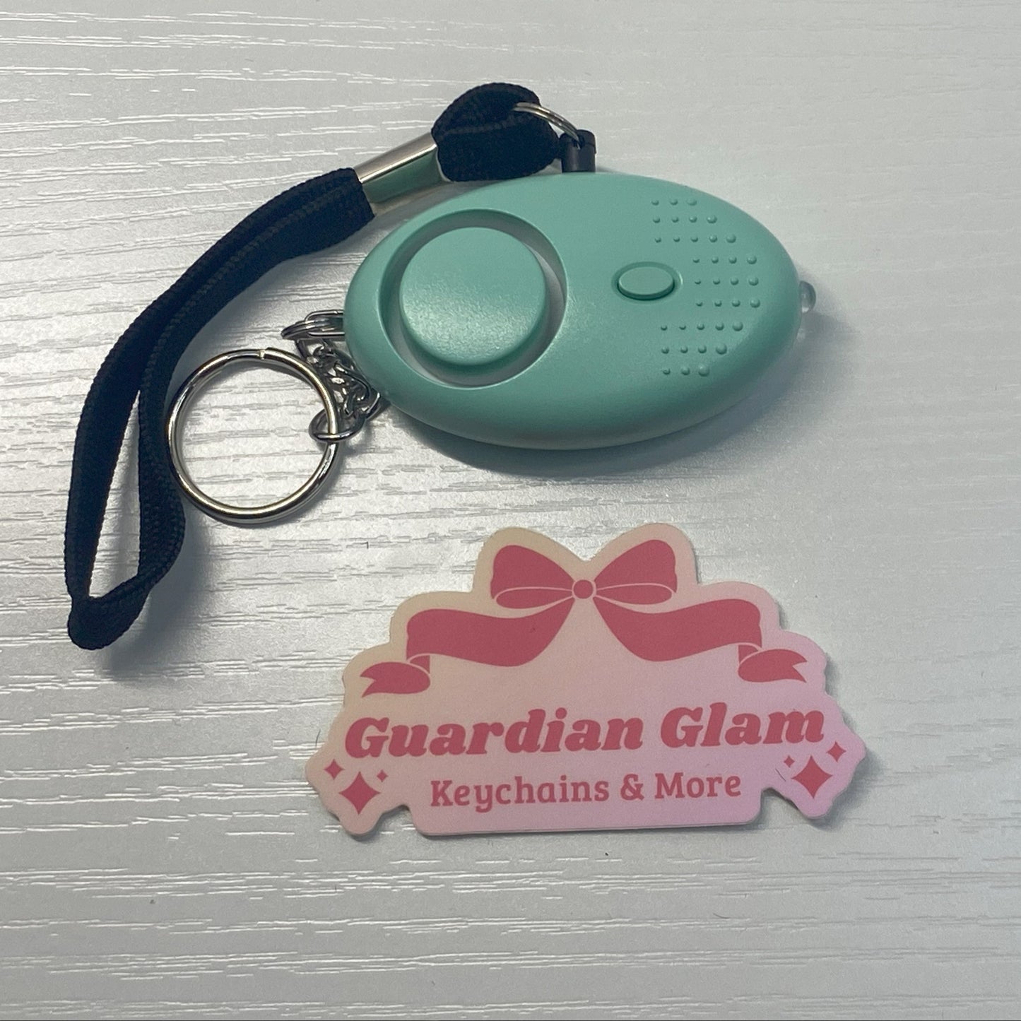 Light Green/ Seafoam Flashlight Alarm Keychain