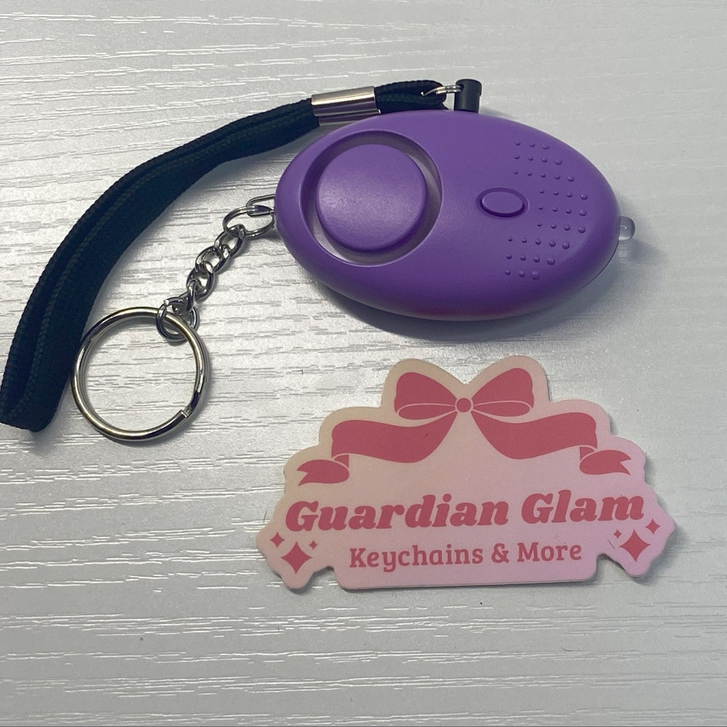 Purple Flashlight Alarm Keychain 